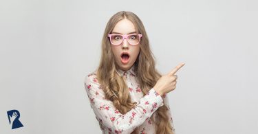 Woman shocked, pointing